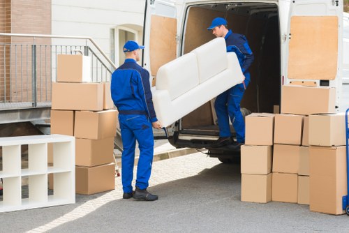 Removal team handling a house move in Wimbledon