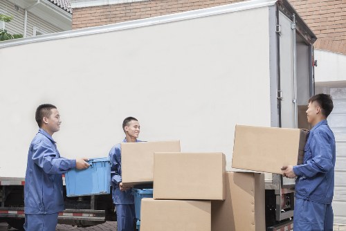 A Wimbledon removal van handling sorted recyclable household items