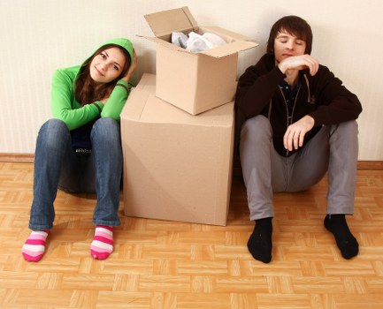 Professional movers carrying student boxes in Wimbledon