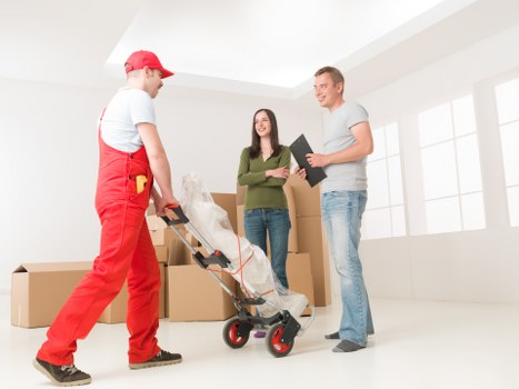 House removalists in Wimbledon unloading items at a new home