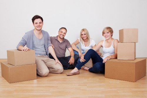 Furniture and household items being moved by a Wimbledon van service